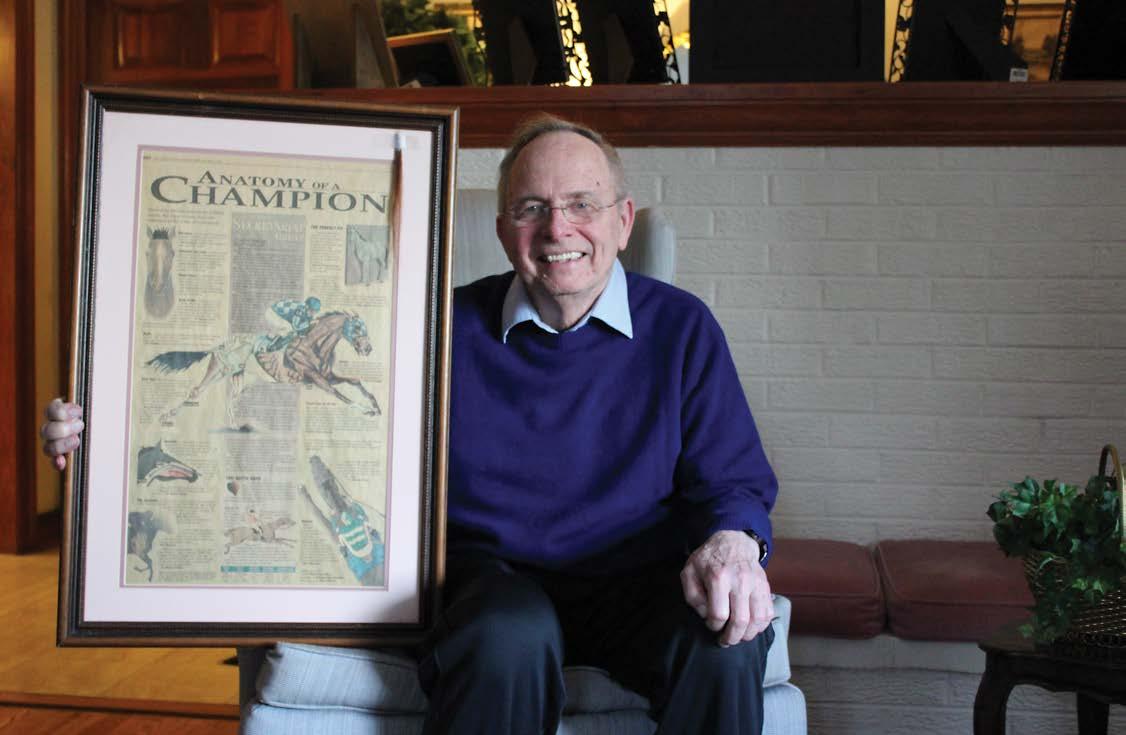 Dr. Swerczek and his framed copy of "Anatomy of a Champion," article
published in the Lexington Herald-Leader, May 6, 1995, adorned with alock of Secretariat's mane.