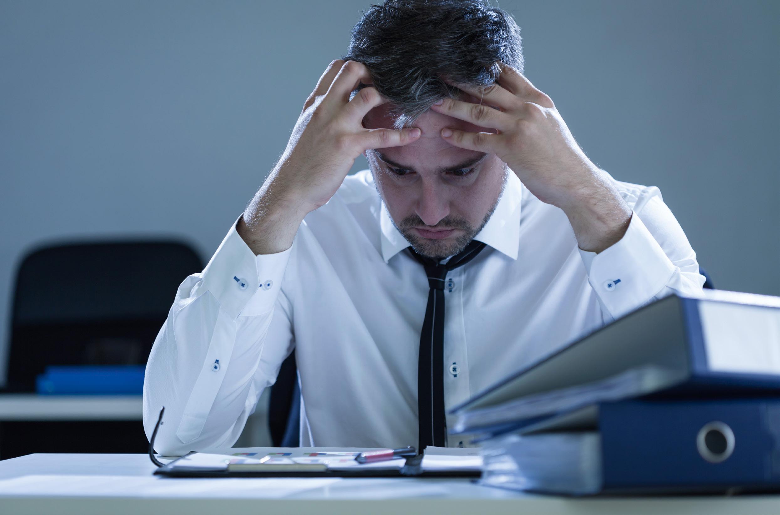 The most stressed. нервозность. The most stressed. страх перед руководителем. девушка в офисе устала.