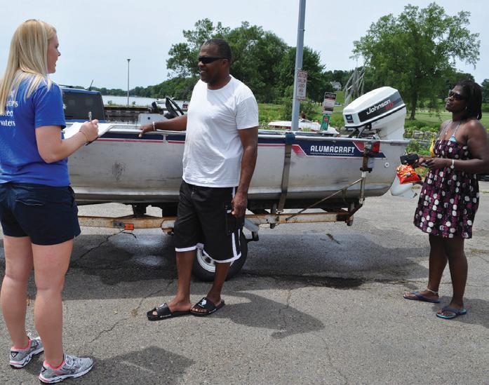 The Clean Boats Clean Waters program includes boat inspections to help boaters understand the vital role they play in preventing invasive species.