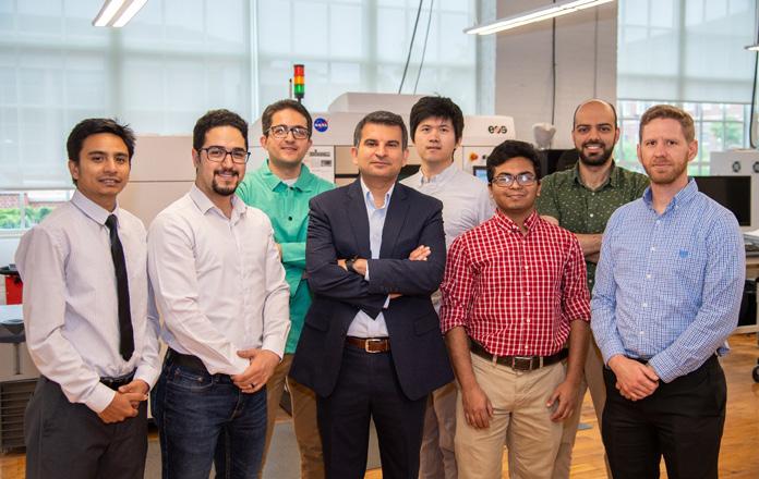 Nima Shamsaei pictured with NCAME Lab Technicians