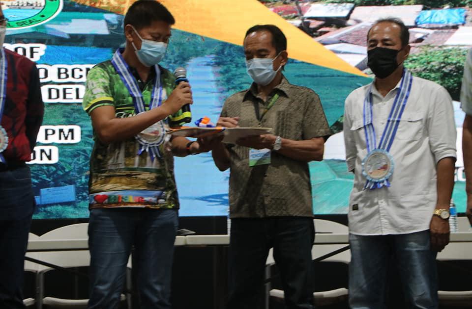 Cover for DPWH TURNS OVER ROAD CONCRETING PROJECT TO BISLIG CITY