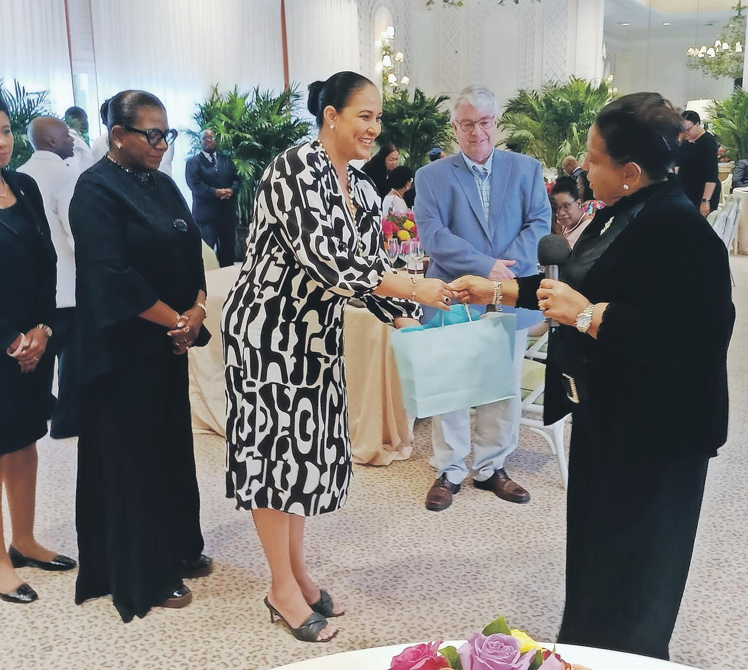 CARICOM spouses luncheon at Lyford Cay Club INSURER: NEW VAT POLICY WILL  INCREASE COSTS - Issuu