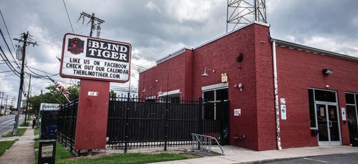 Cover for Charges dropped against former Blind Tiger owner