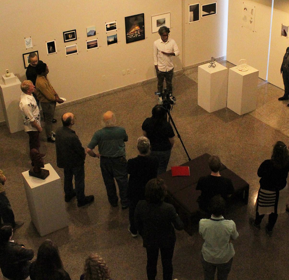 Cover for Students display art in W. Campus gallery