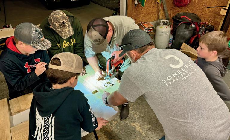 Strickland's Crossroads 4-H members build duck nesting box